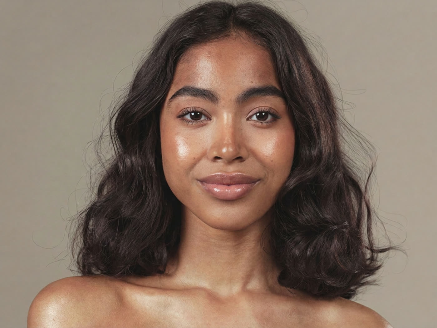 The same photo with an AI lip filler preview applied by Mirror